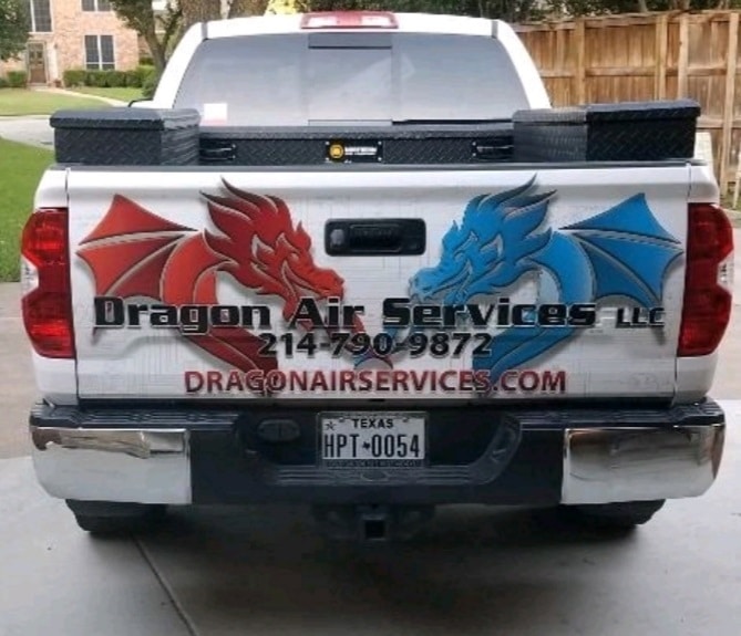 Dragon Air Services truck with contact information